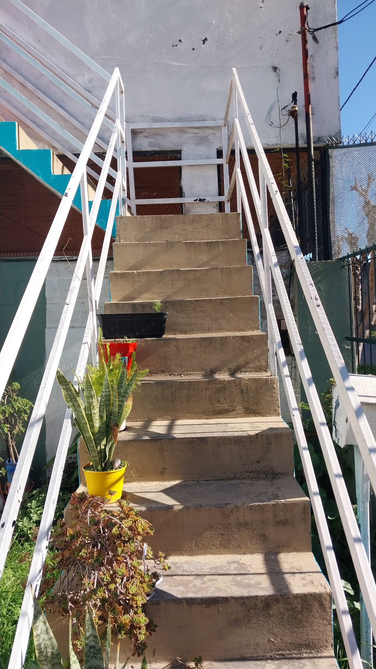 Escalera a planta alta