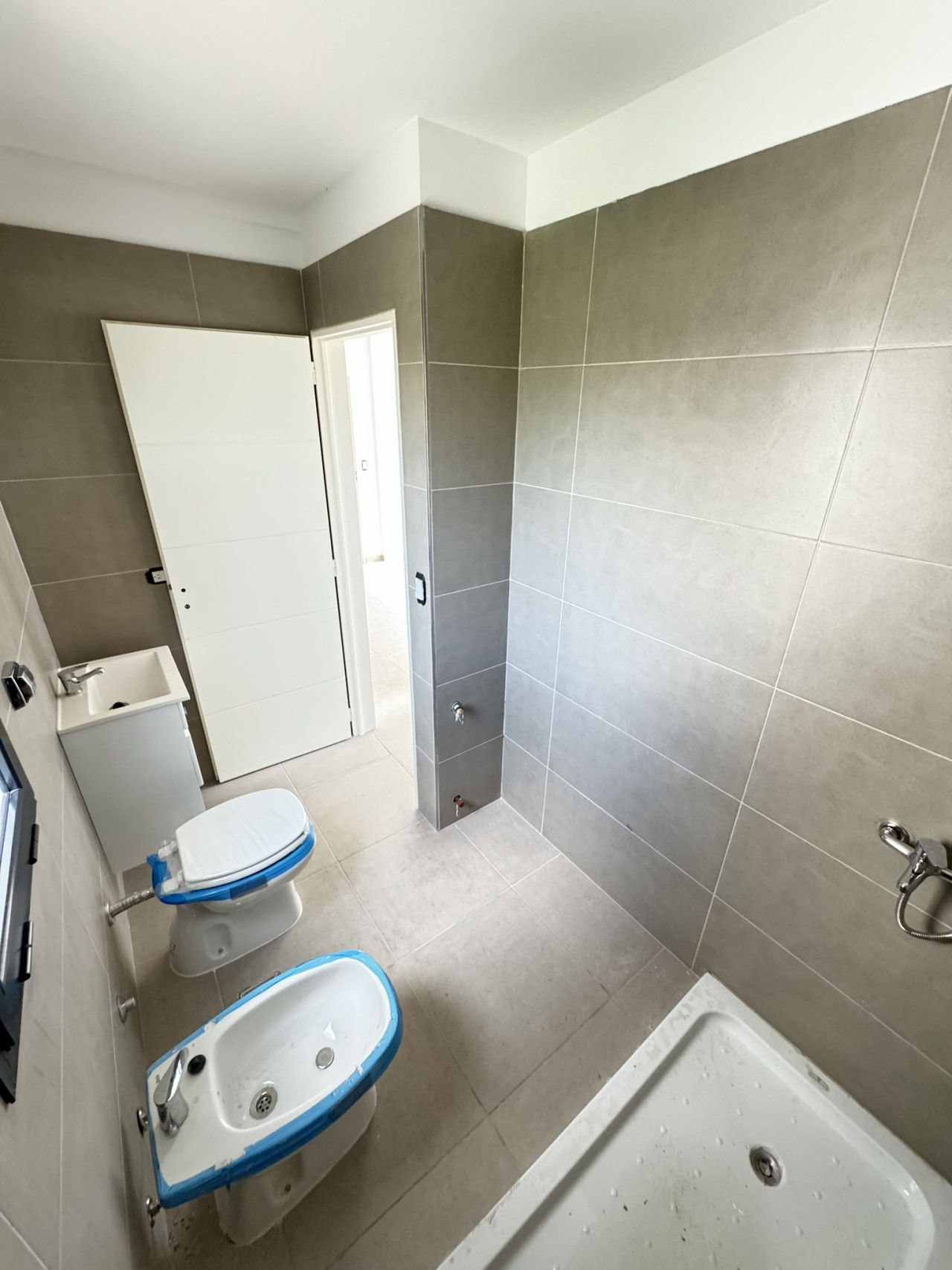 BAÑO CON RADIADOR